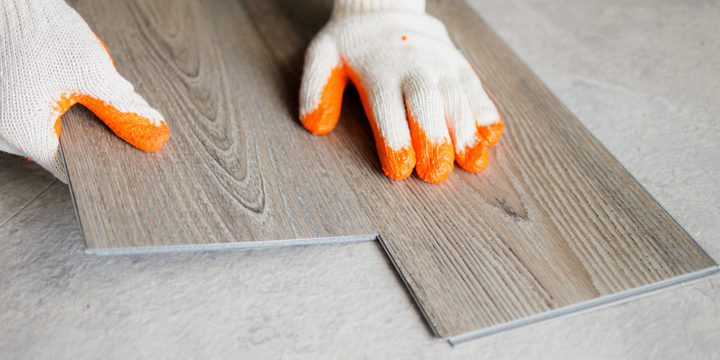 preparing floor construction by installing wood tile